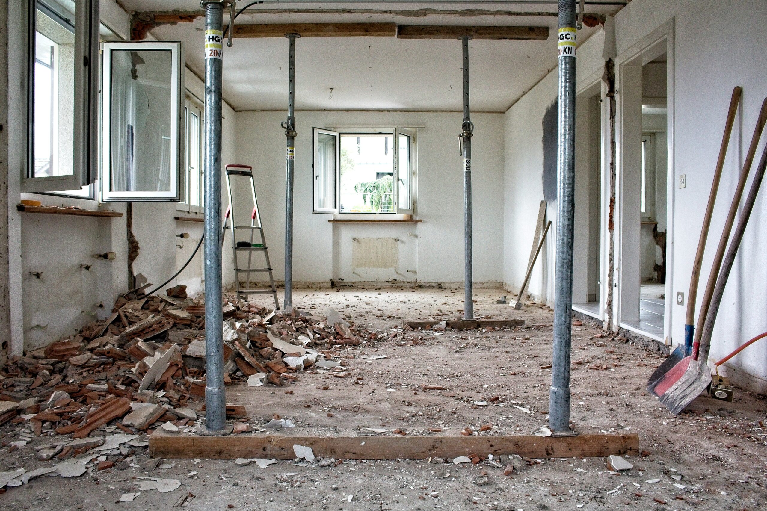 An excavator attachment processing site structural debris to satisfy demolition nvq qualification portfolio evidence.