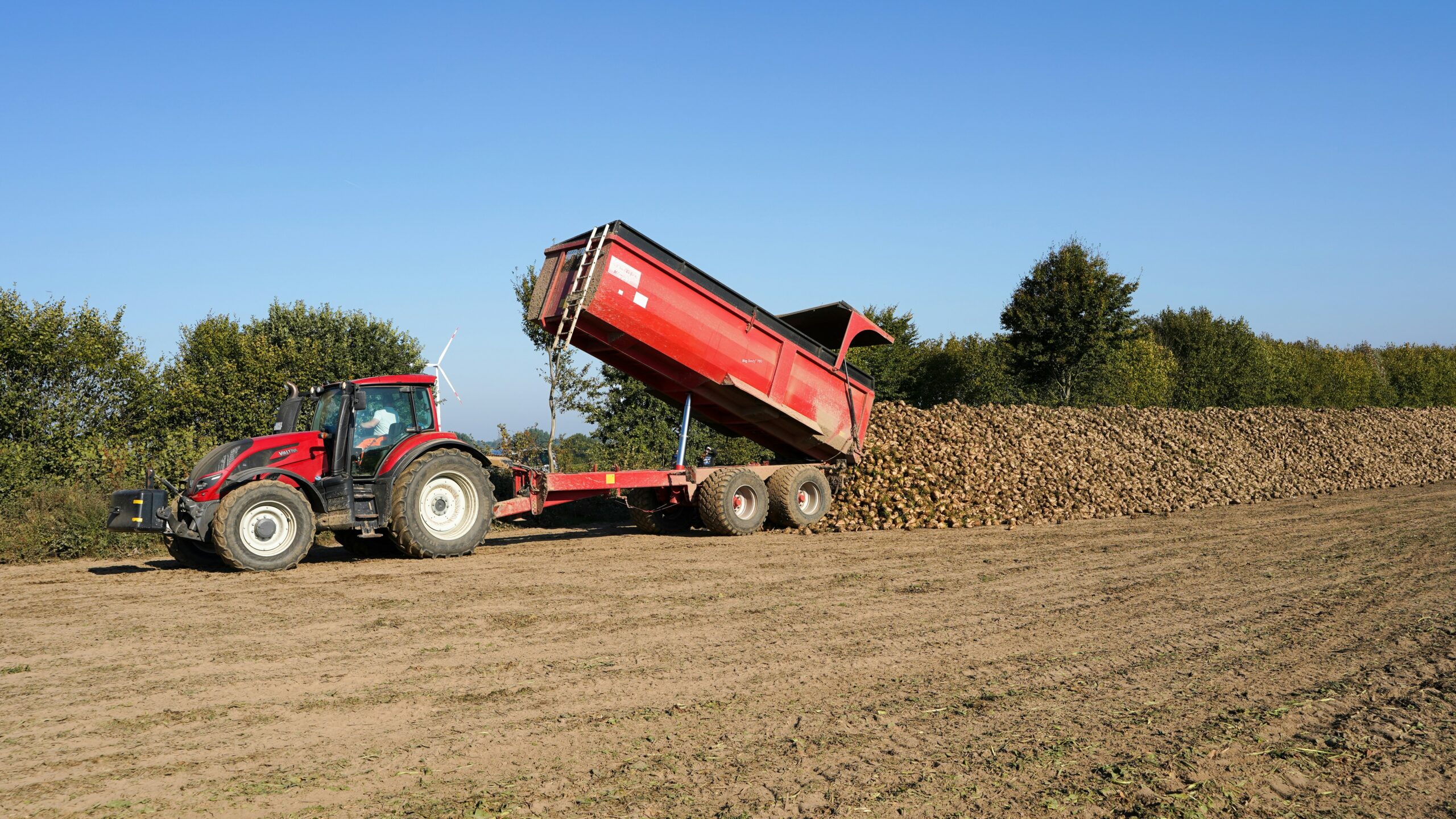 A professional plant operator handling a modern telescopic handler during a practical CPCS A17 training session.